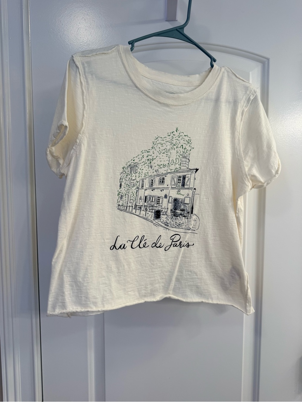 Maeve Cream Tee with Green & Black Line Illustration